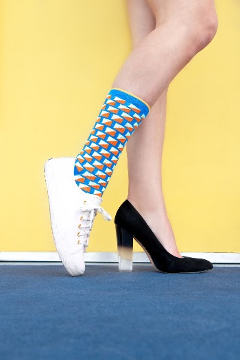 "Decisions, decisions" - Sneakers or high heels, that's the question.