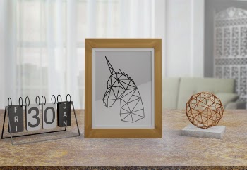 Decorative frame mockup on table at home Free Psd
