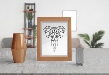 Decorative frame mockup on table at home Free Psd