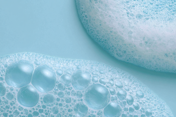 Delicate Foam Bubbles on Aqua Surface