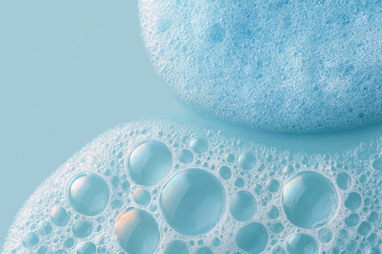 Delicate Soap Bubbles on Aqua Background