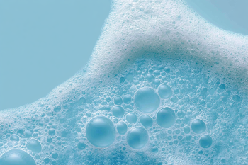 Delicate Soap Foam Bubbles on Aqua Surface