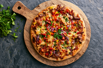 Delicious BBQ Vegetable Pizza on Rustic Board