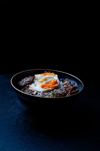 Delicious Bowl of Japanese Udon Noodles with Soft-Boiled Eggs