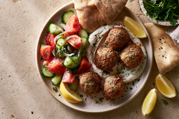 Delicious Falafel Platter with Fresh Salad and Pita