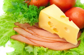 Delicious ham, cheese, tomato, parsley and salad
