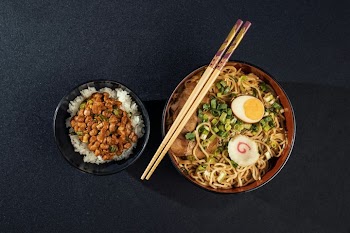 Delicious Japanese Noodle Bowl with Rice and Toppings