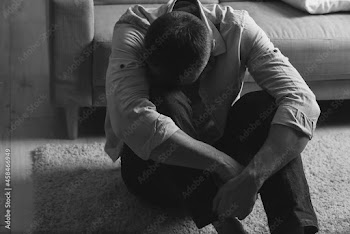 Depressed mature man at home