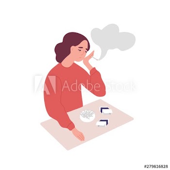 Depressed young woman smoking cigarettes