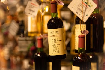 Depth Photography of Green Labeled Bottle
