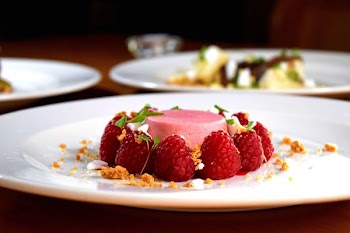 desert with red berries on plate