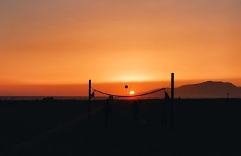 deserted beach with volleyball net