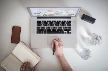 Designer Working On Laptop