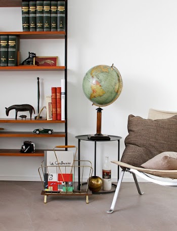 Desk Globe on End Table Beside Chair