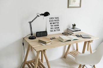 Desk Setup With Motivational Poster