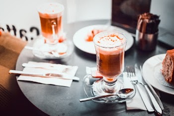 Dessert in Glass Near Gray Stainless Steel Spoon, Fork, and Knife