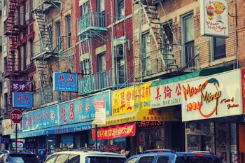 Different Store Signages on Brick Building
