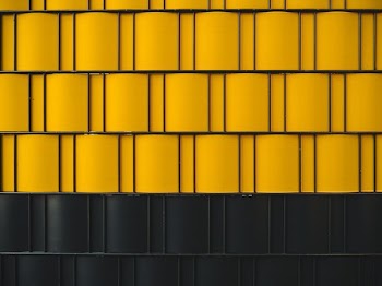 digital wallpaper of yellow and black wall