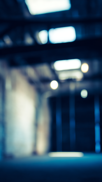 Dimly Lit Urban Loft with Soft Blue Ambient Light