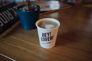 Disposable Cup With Latte and Hey! Lover! Printed Text