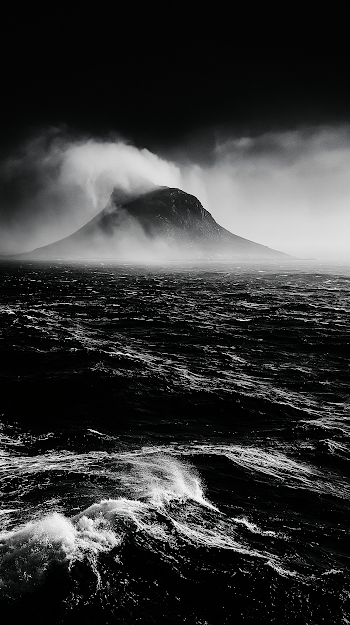 Distant Island Amidst Ocean Storm