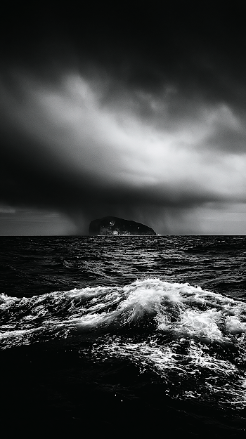 Distant Island in a Stormy Ocean