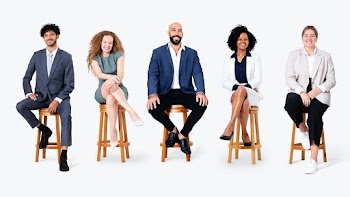 Diverse business people smiling while sitting… | Free stock photo | High Resolution image
