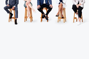 Diverse business people smiling while sitting… | Free stock photo | High Resolution image