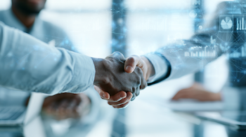 Diverse Business Professionals in Partnership Agreement