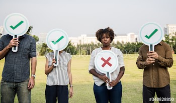 Diverse friends holding checkmark icons