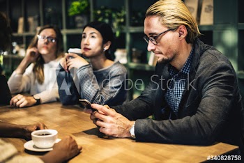 Diverse friends meeting at a cafe