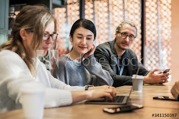 Diverse friends meeting at a cafe