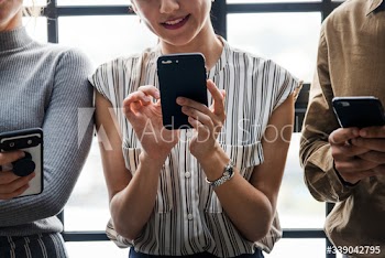 Diverse people using phone