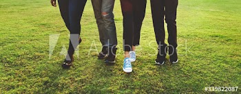 Diverse people walking in the park