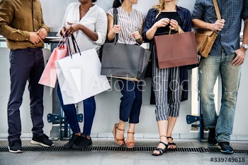 Diverse people with shopping bags