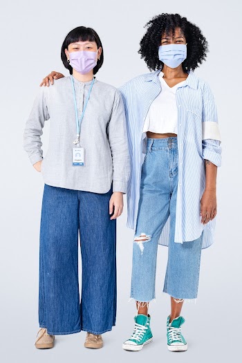 Diverse women volunteers wearing face mask in… | Free stock photo | High Resolution image