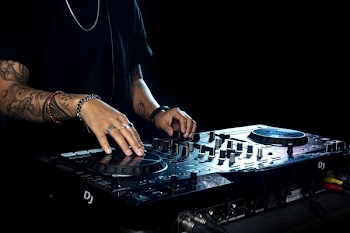 DJ Spins And Mixes