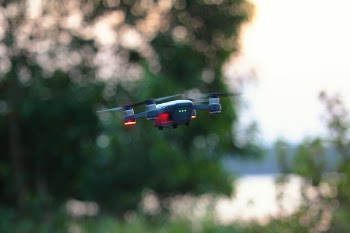 Dji Mavic Air on Mid Air Near Trees