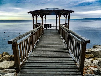 Dock Near Cliff during Blue Hour