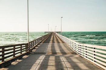 dock surrounded by body of water