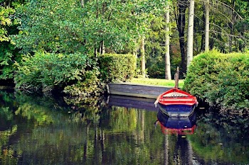 Docked Boat on Body of Water