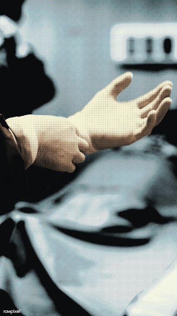 Doctor putting on a glove to prevent coronavirus contamination | Free  photo - 2302842