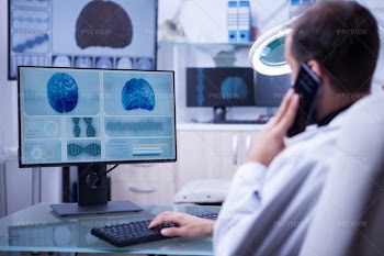 Doctor Talking On The Phone