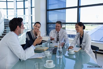 Doctors and hospital administrator meeting