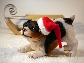 Dog Wearing Santa Hat Figurine