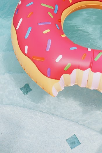 donut floatie in pool