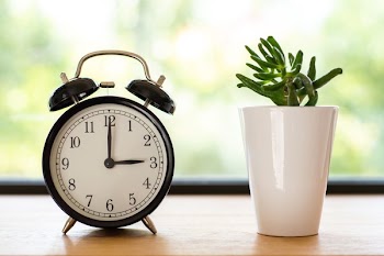 Double Bell Alarm Clock Displaying 3:00 Time
