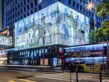 Double Decker Bus In Front Of Building