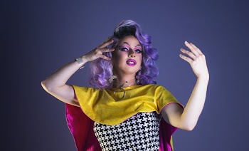Drag Queen Runs Fingers Through Wig