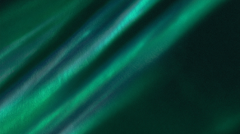 Dreamy Abstract Light Streaks in Teal and Emerald